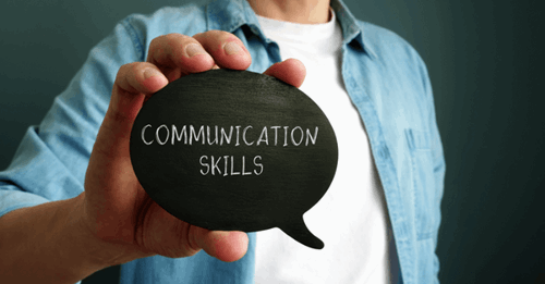 man holding a good communication sign