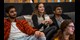 students watching a movie at the aparto stoneworks lounge