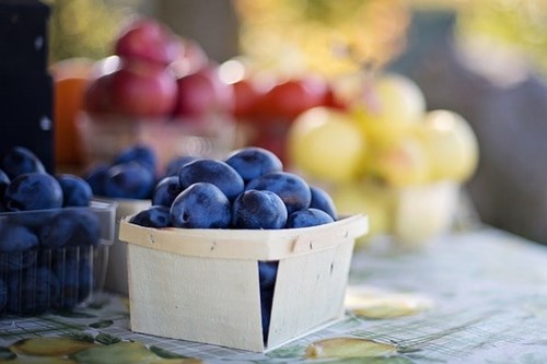Plums at a market