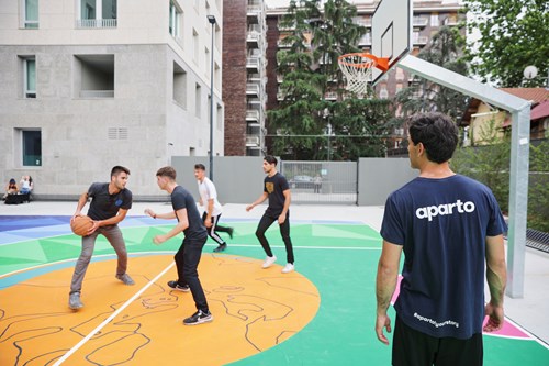 students playing basketball