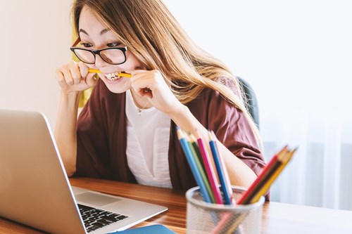a person getting stressed at their laptop