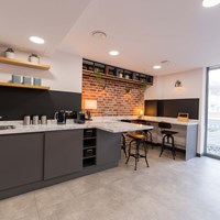 aparto stoneworks lounge kitchen