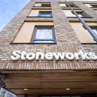Stoneworks sign on the front building