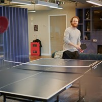 Students play ping pong