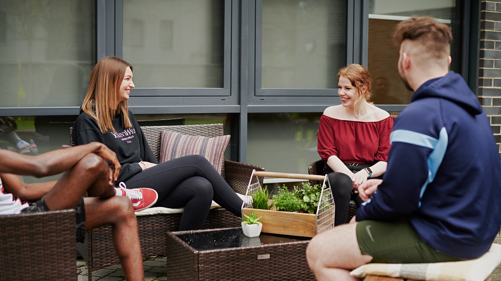 Students converse outdoors