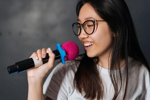 student at a karaoke