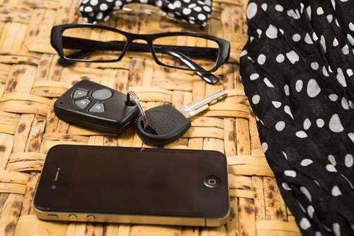 phone, key and glasses