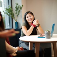 students conversing in beckett house common room